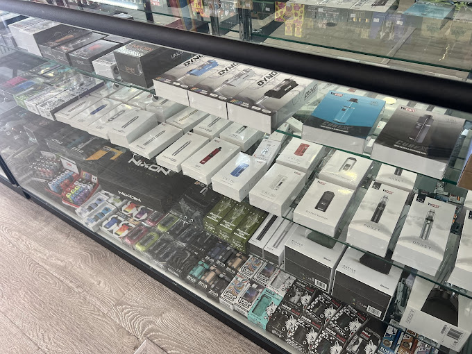 A display case filled with electronic devices in a store