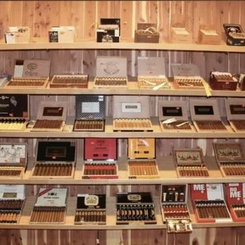 A display case filled with lots of different types of cigars