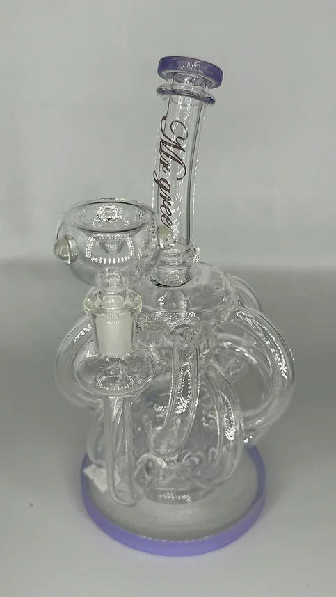 A clear glass bong with a blue base